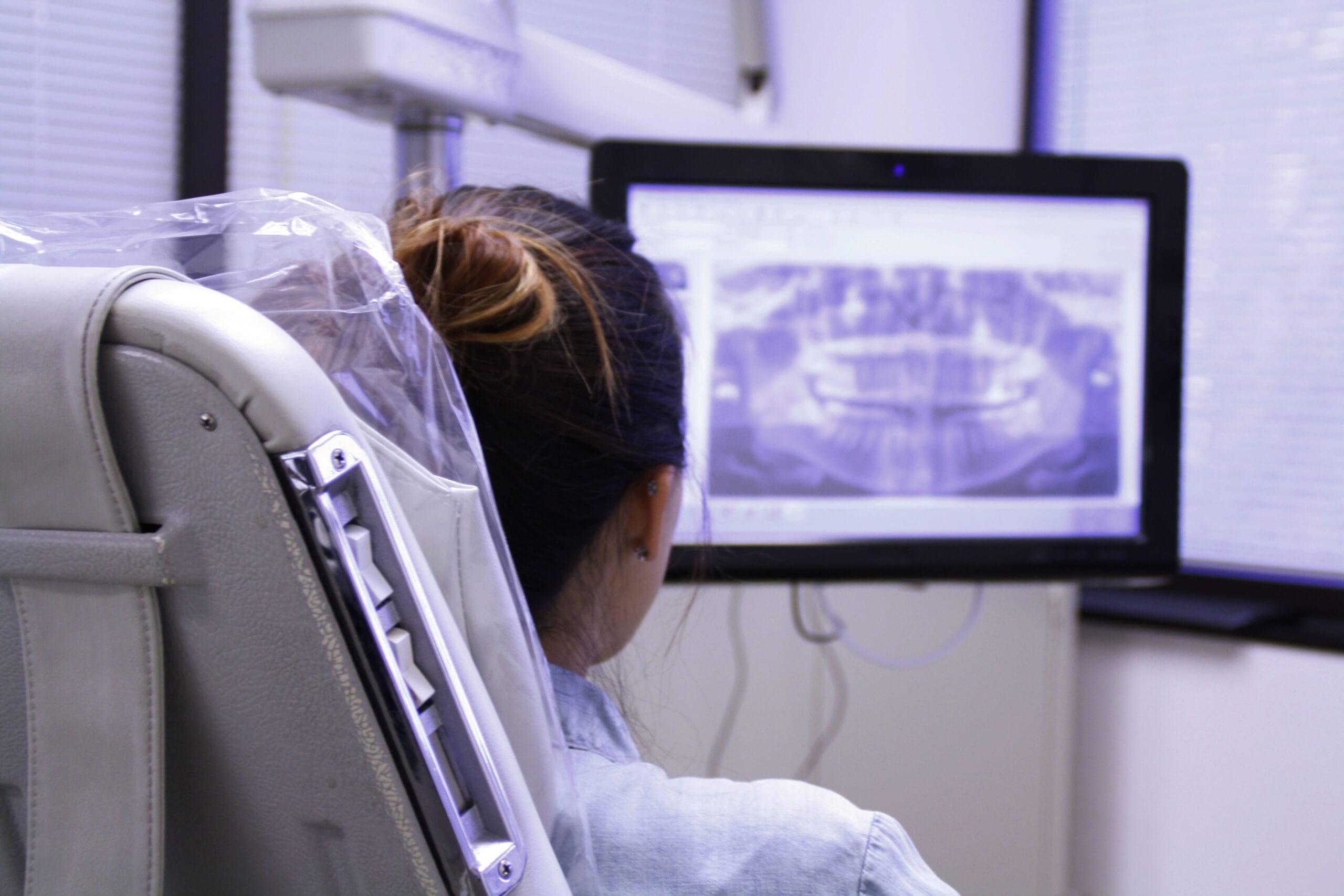 patient looking at X-rays