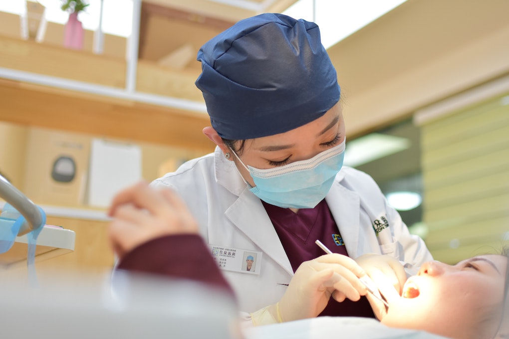 dentist working on patient