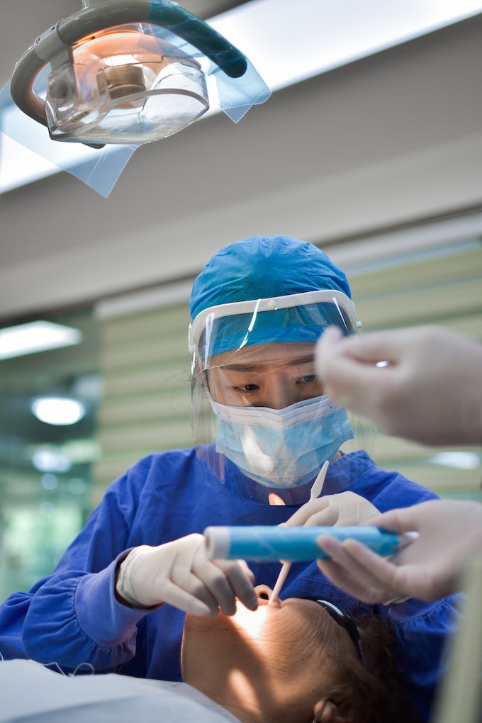 dentists working on patient