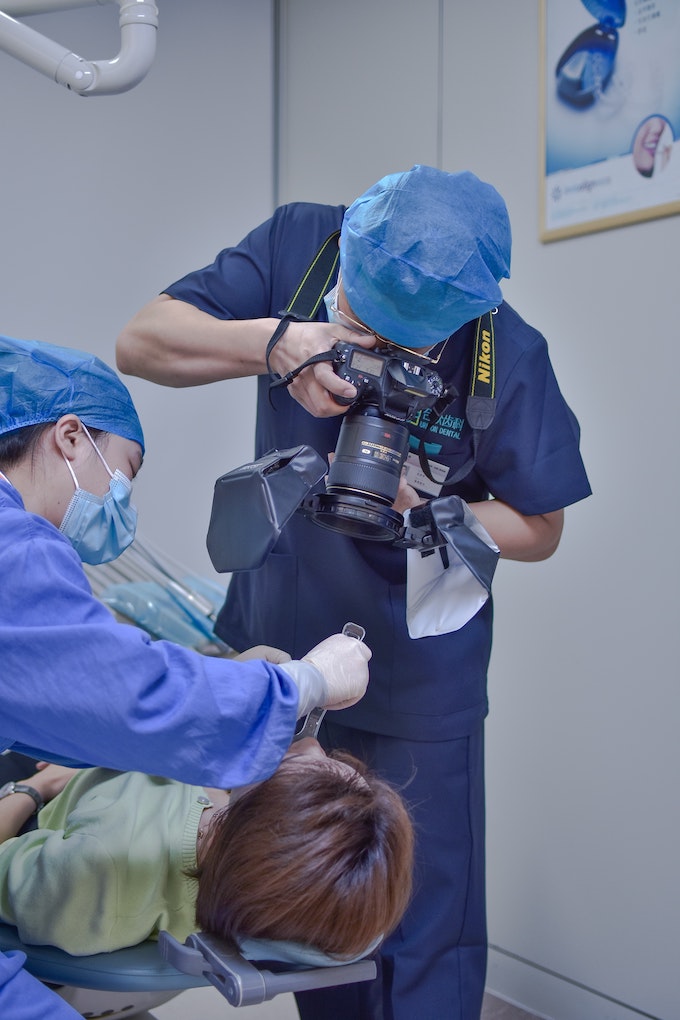 dentists working on patient