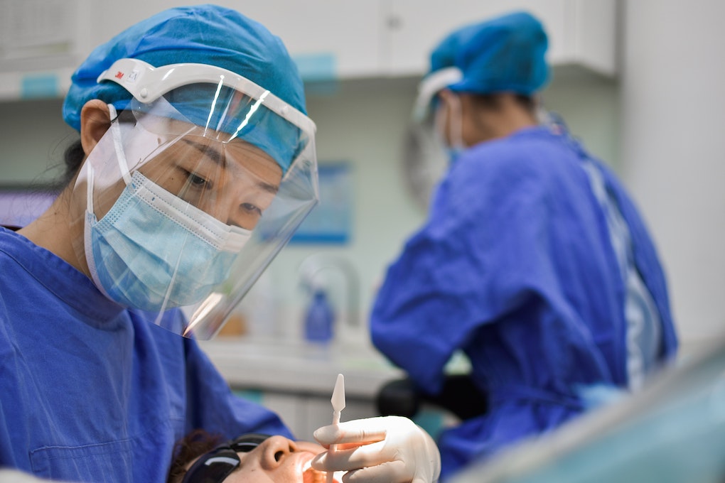 dentist working on patient