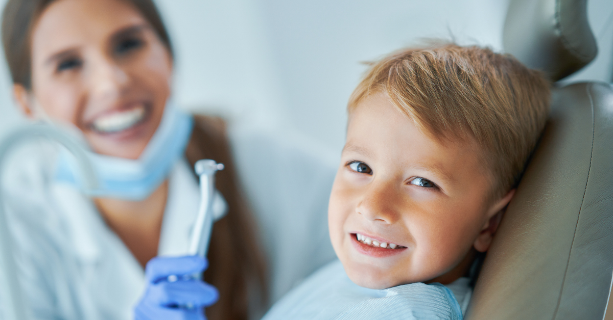 dentist and patient smiling