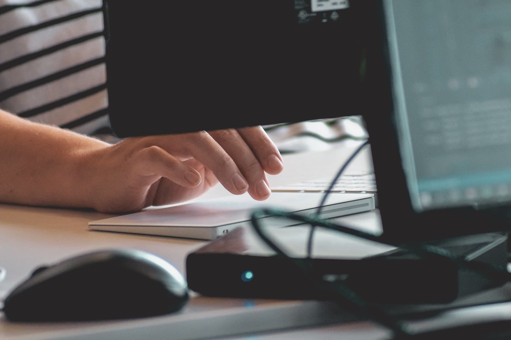 person on computer