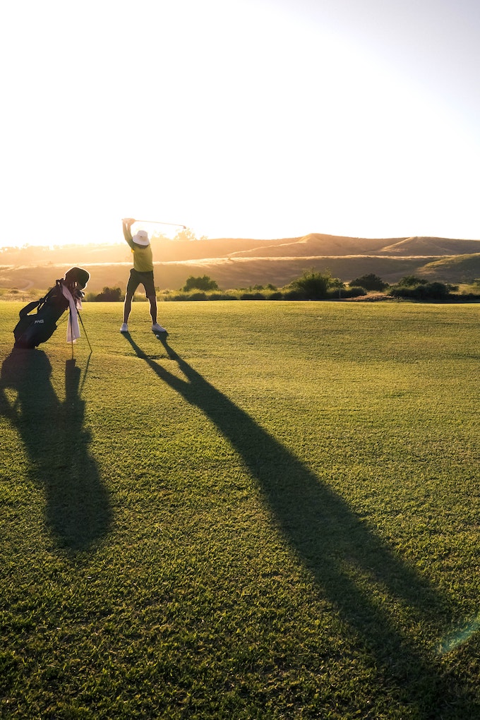 golfer swinging a club