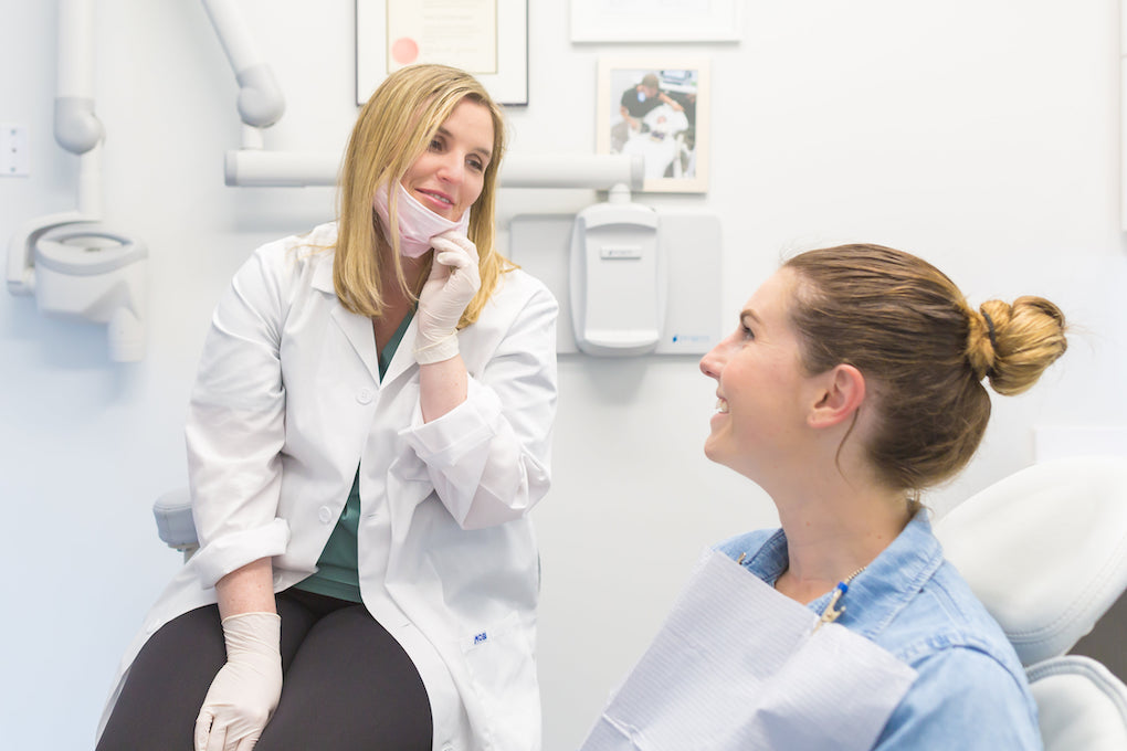 dentist smiling at patient